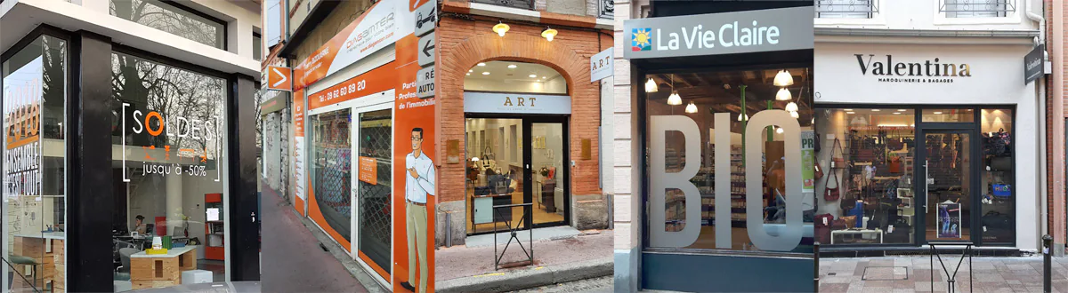 Lettres relief montées sur entretoises - Stickers aspect verre sablé sur vitres - Agence habillée par un bardage aluminium thermolaqué recouvert de lettrages et motifs adhésifs